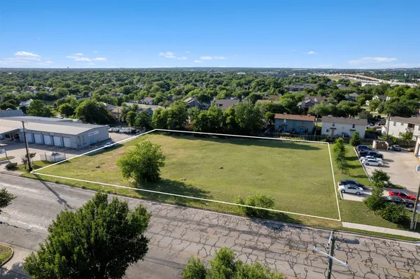 a view of a swimming pool and a yard