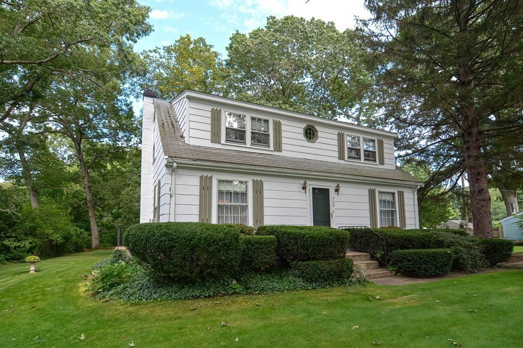 553 Winter Street Walpole, MA 02081 - Photo 13 of 42 a front view of a house with a yard