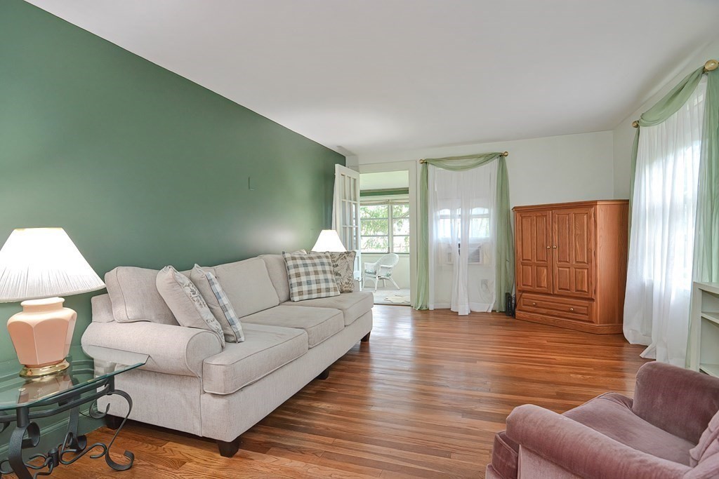 553 Winter Street Walpole, MA 02081 - Photo 14 of 42 a living room with furniture and wooden floor