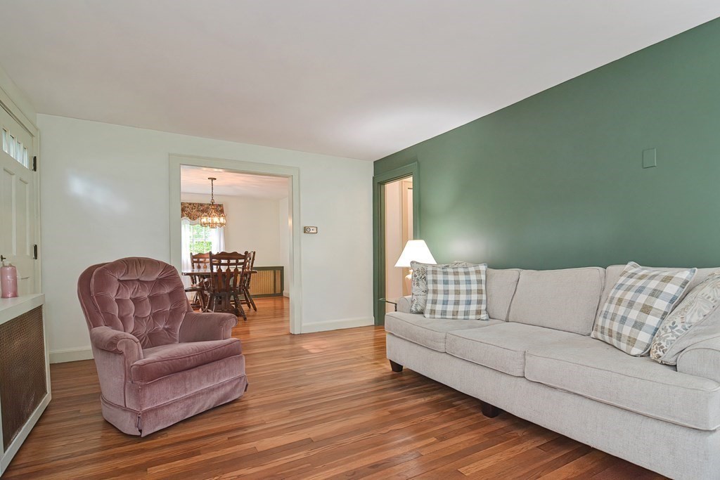 553 Winter Street Walpole, MA 02081 - Photo 15 of 42 a living room with furniture and a couch