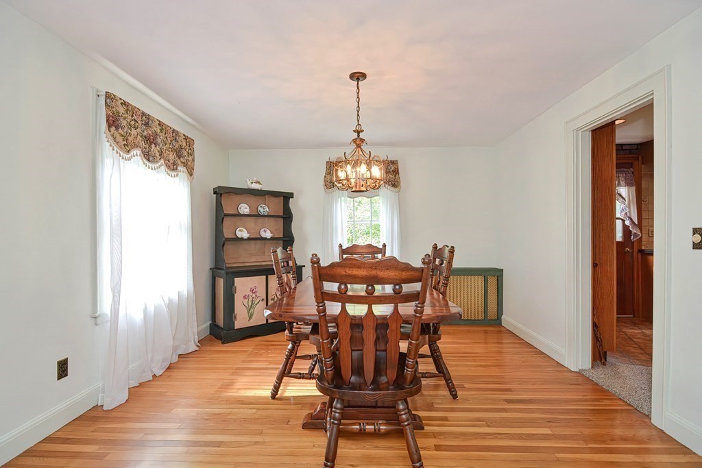 553 Winter Street Walpole, MA 02081 - Photo 19 of 42 a dining room with furniture and window