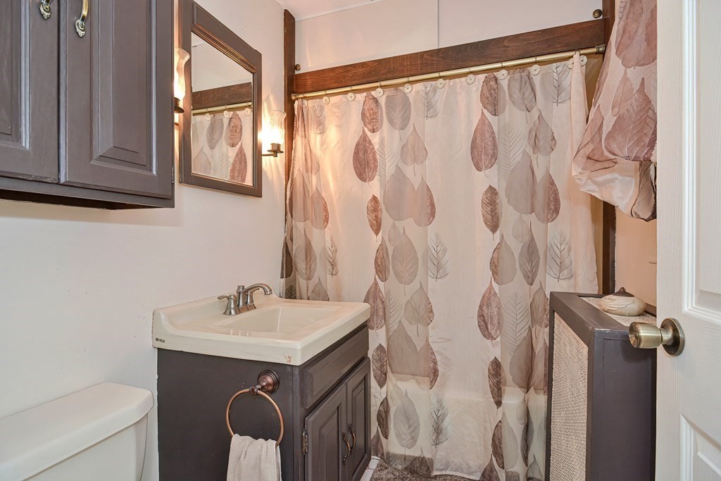 553 Winter Street Walpole, MA 02081 - Photo 24 of 42 a utility room with a sink dryer and washer