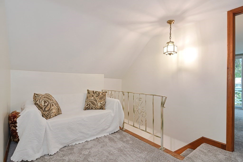 553 Winter Street Walpole, MA 02081 - Photo 28 of 42 a bedroom with a bed and a ceiling fan