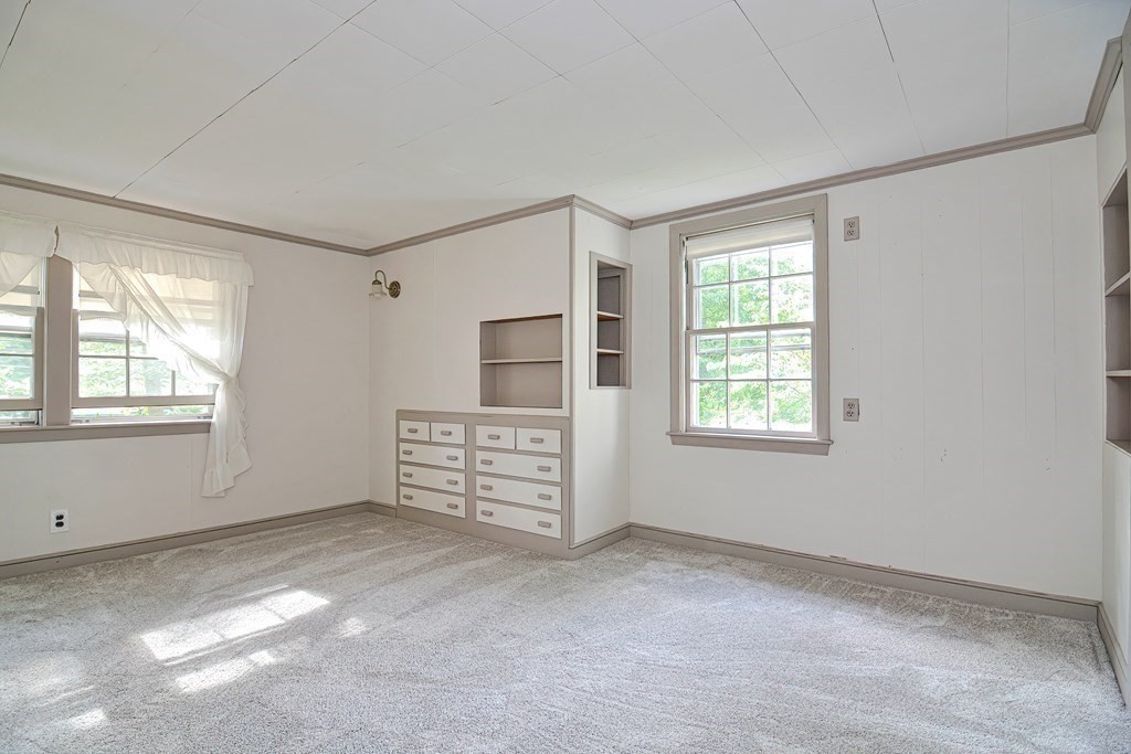 553 Winter Street Walpole, MA 02081 - Photo 32 of 42 an empty room with windows