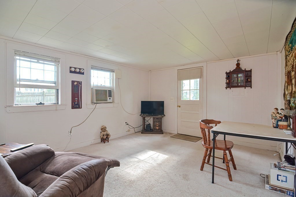 553 Winter Street Walpole, MA 02081 - Photo 38 of 42 a bedroom with furniture and a window