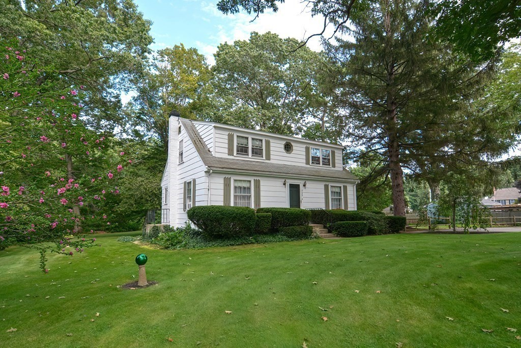553 Winter Street Walpole, MA 02081 - Photo 4 of 42 a front view of house with yard and green space
