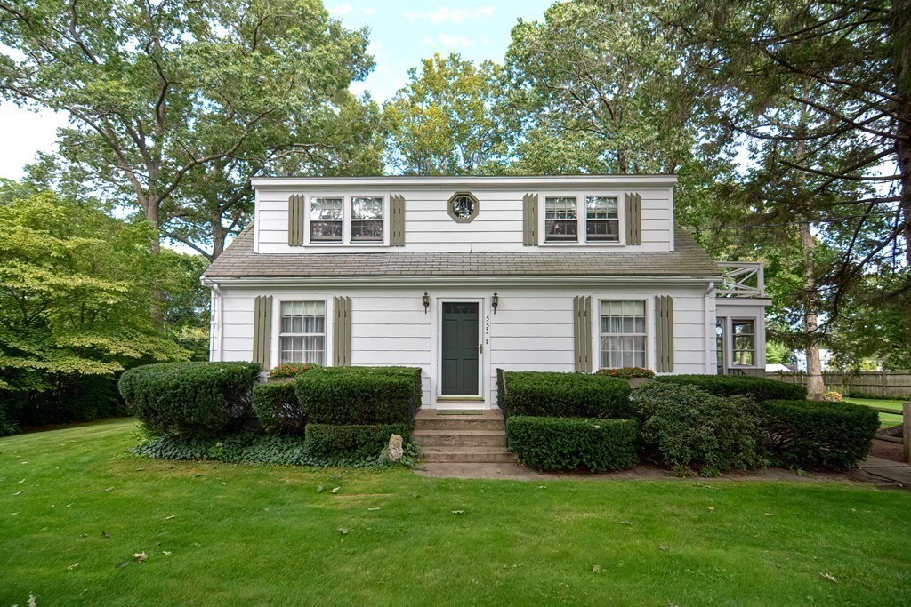 553 Winter Street Walpole, MA 02081 - Photo 5 of 42 a front view of house with yard and green space