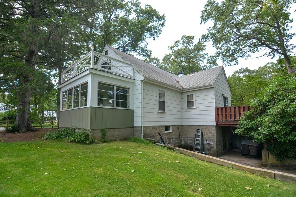 553 Winter Street Walpole, MA 02081 - Photo 7 of 42 a view of a house with a backyard