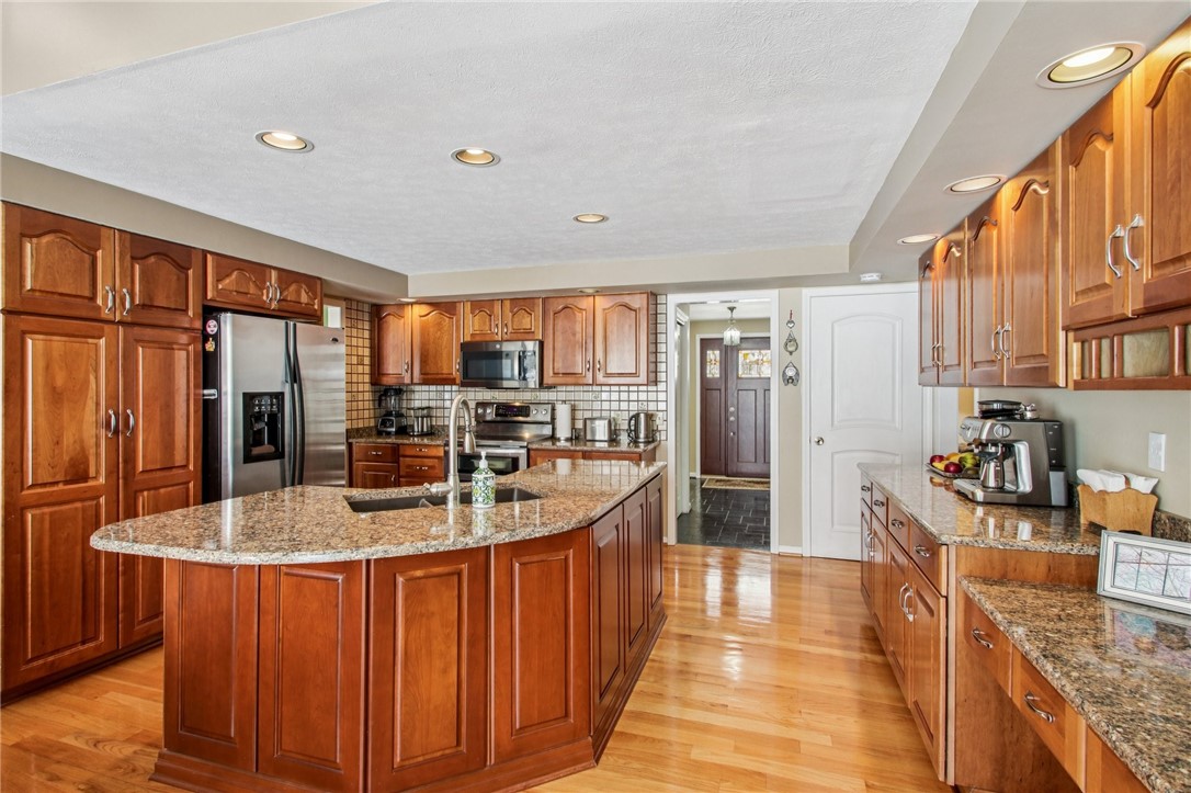 26 Misty Pine Road Perinton, NY 14450 - Photo 3 of 38 Cherry & Quartz Kitchen
