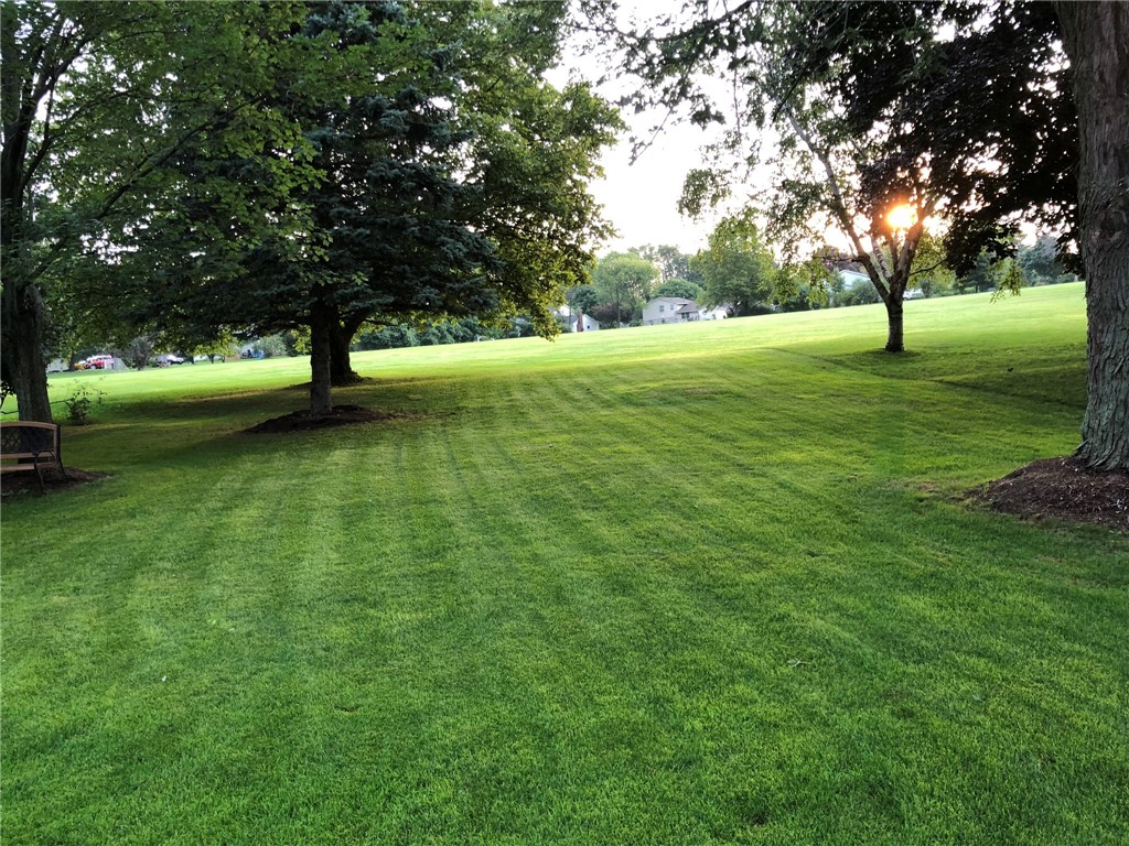 26 Misty Pine Road Perinton, NY 14450 - Photo 36 of 38 Deck opens to Winding Brook Neighborhood Park