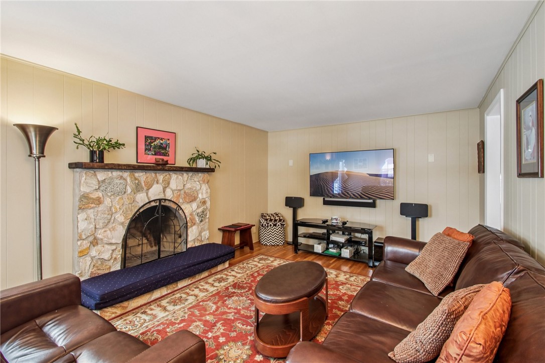 26 Misty Pine Road Perinton, NY 14450 - Photo 10 of 38 Family Room w/wood burning fireplace