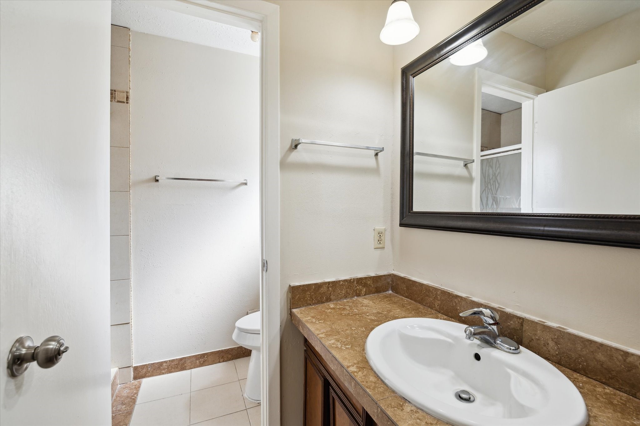 4226 Mossygate Drive Spring, TX 77373 - Photo 13 of 16 a bathroom with a sink and a mirror