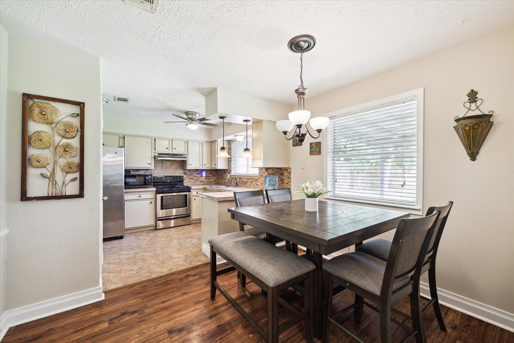 4226 Mossygate Drive Spring, TX 77373 - Photo 2 of 16 Dining Room to Kitchen View
Open-concept layout with a view from the dining area into the functional kitchen space