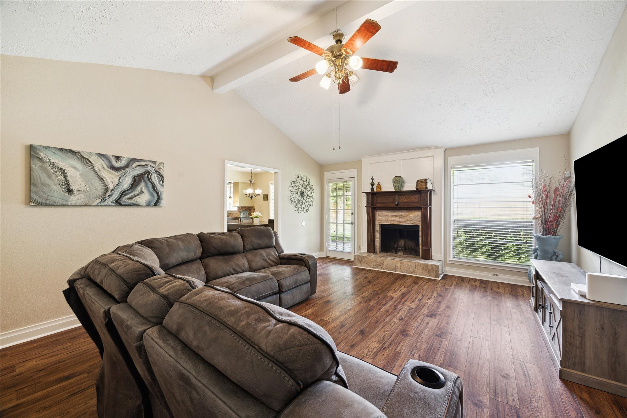4226 Mossygate Drive Spring, TX 77373 - Photo 7 of 16 a living room with furniture fireplace and flat screen tv