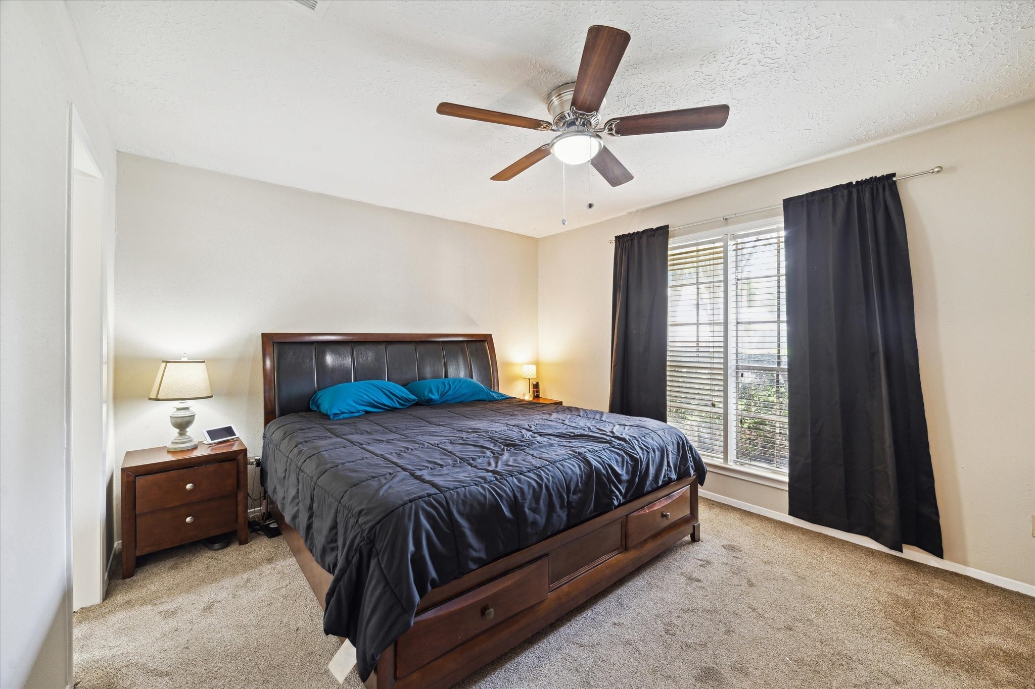 4226 Mossygate Drive Spring, TX 77373 - Photo 10 of 16 a bedroom with a bed and window