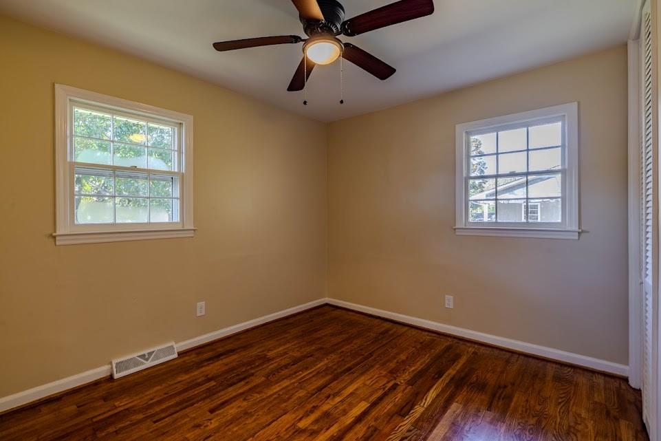 102 Beech Creek Drive Northwest Rome, GA 30165 - Photo 6 of 11 a room with wooden floor and windows