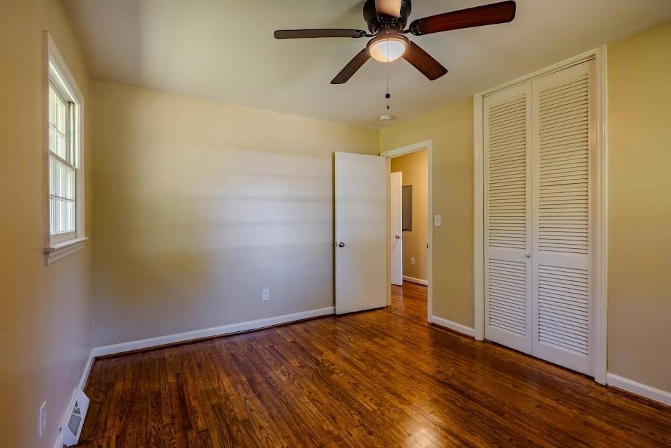 102 Beech Creek Drive Northwest Rome, GA 30165 - Photo 8 of 11 wooden floor in an empty room with a window