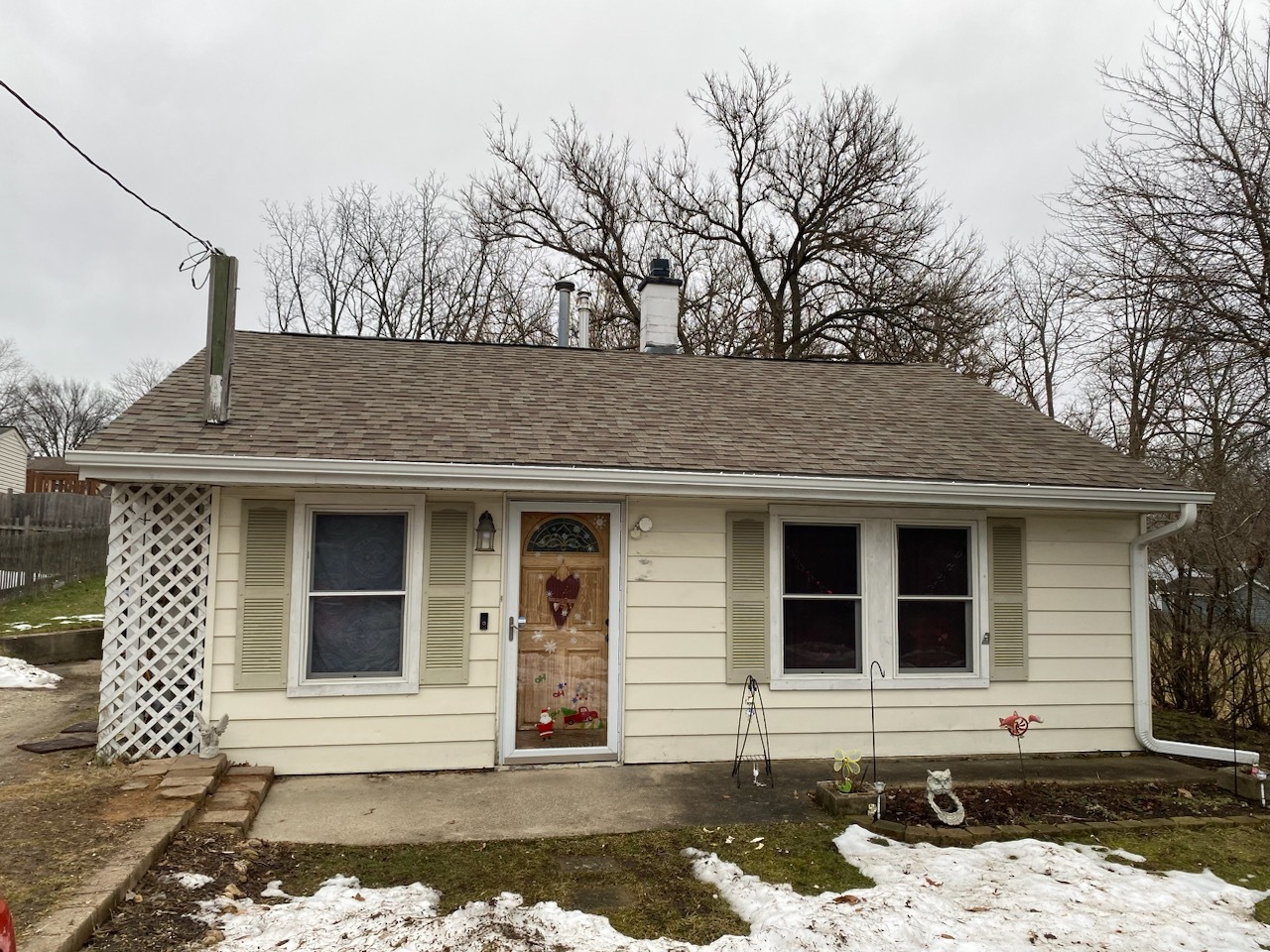 7712 Carleton Drive Spring Grove, IL 60081 - Photo 1 of 1 a front view of a house