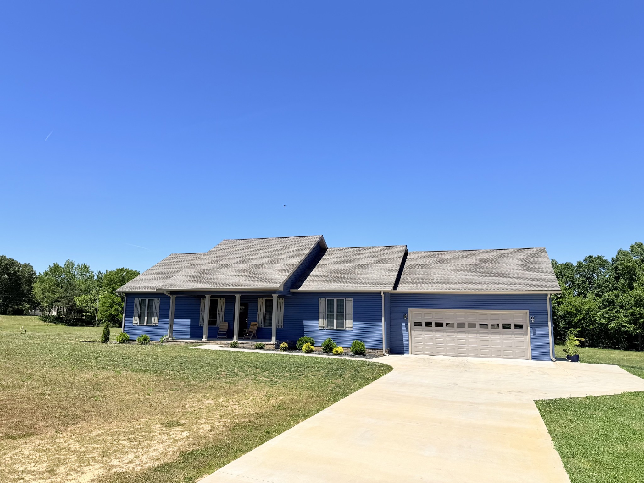 745 Alman Cemetery Road Paris, TN 38242 - Photo 31 of 31 a front view of a house with a garden