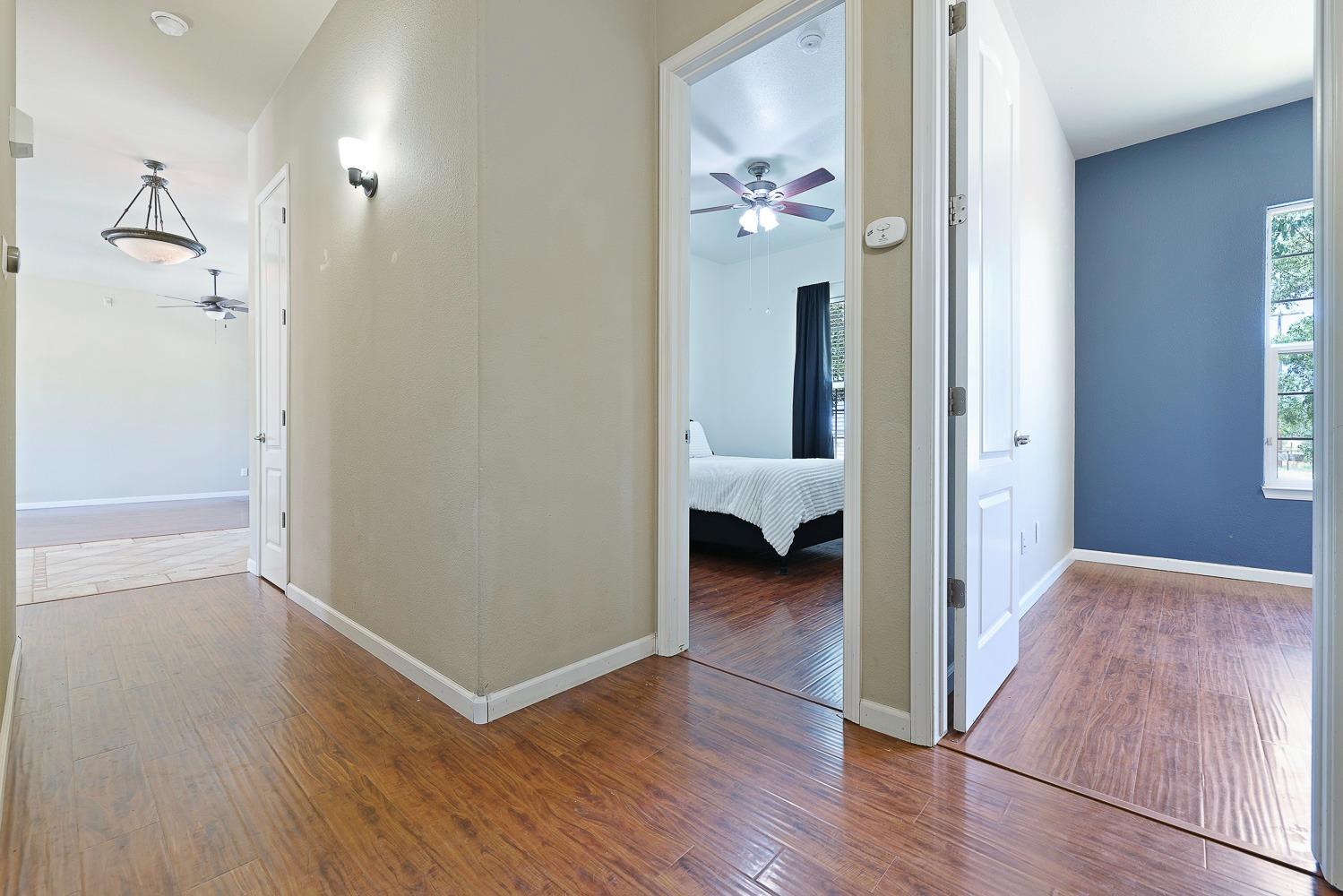 16787 Monreal Road Madera, CA 93636 - Photo 19 of 35 wooden floor in a gallery