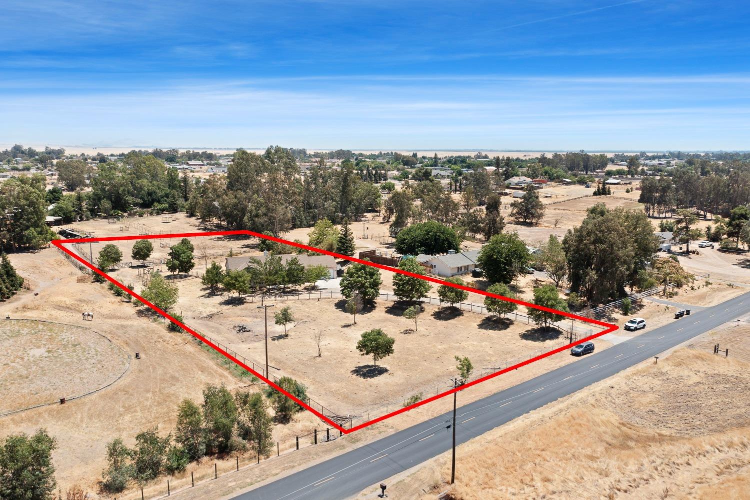 16787 Monreal Road Madera, CA 93636 - Photo 27 of 35 a view of a terrace with sky view