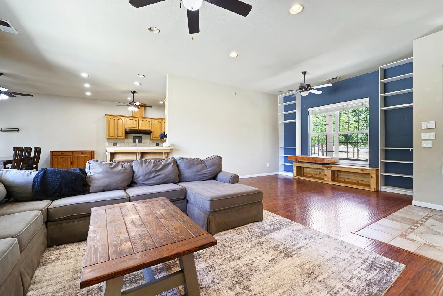 16787 Monreal Road Madera, CA 93636 - Photo 8 of 35 a living room with furniture and a large window
