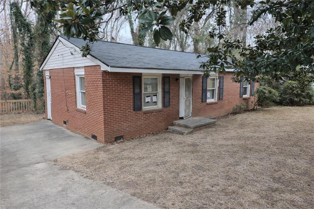334 Argus Circle Northwest Atlanta, GA 30331 - Photo 14 of 14 front view of a house with a dry yard