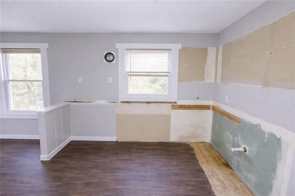 334 Argus Circle Northwest Atlanta, GA 30331 - Photo 4 of 14 an empty room with wooden floor and windows