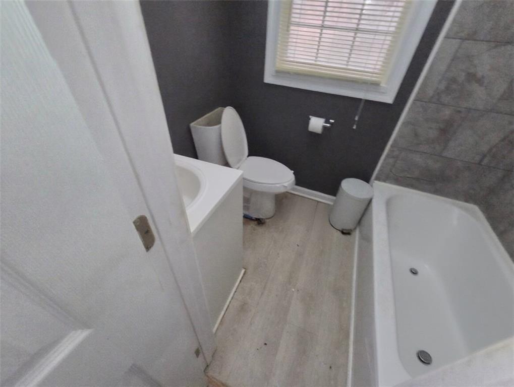 334 Argus Circle Northwest Atlanta, GA 30331 - Photo 8 of 14 a bathroom with a sink and toilet