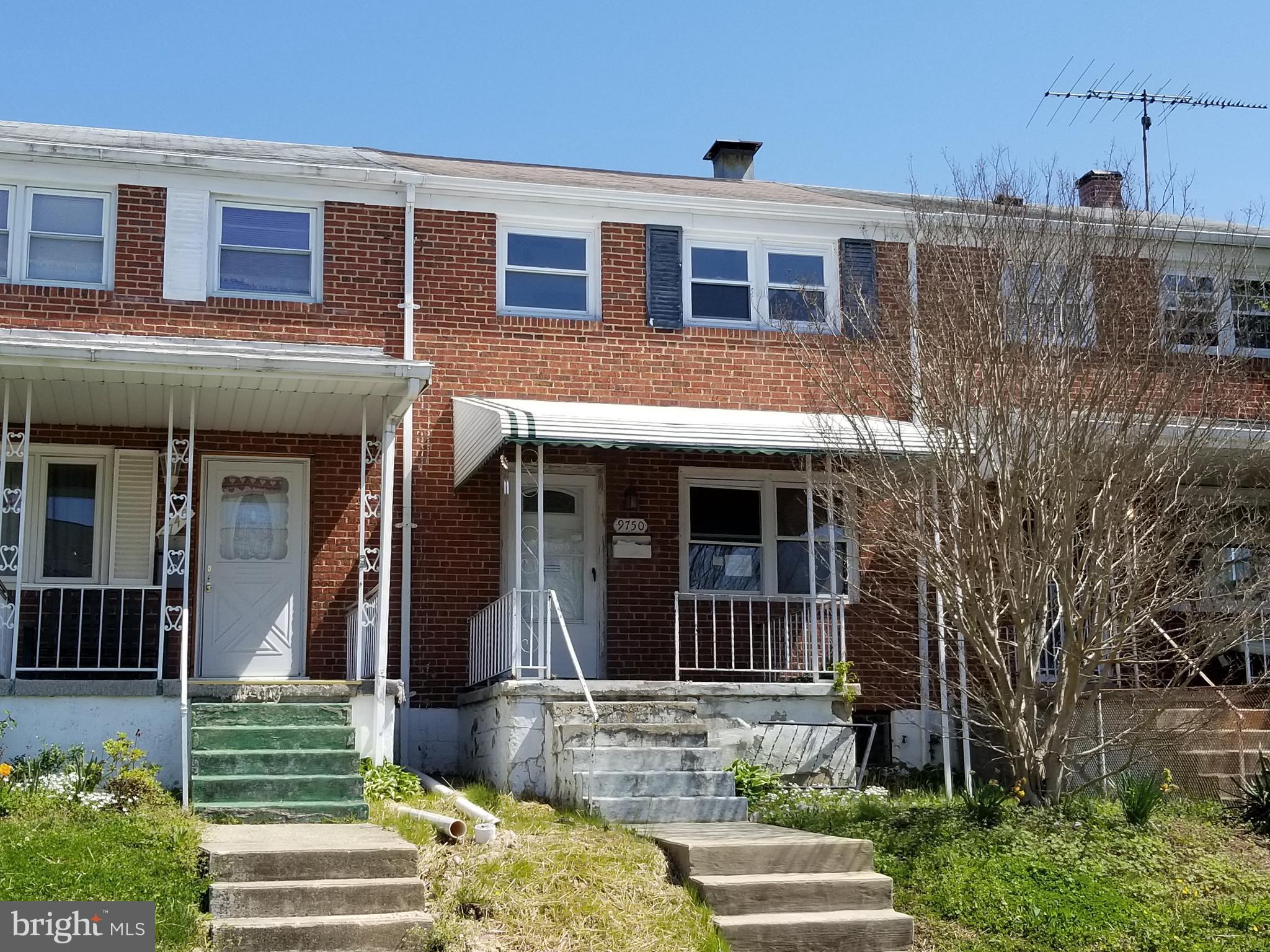 9750 Conmar Road Baltimore, MD 21220 - Photo 1 of 20 a front view of a house with garden