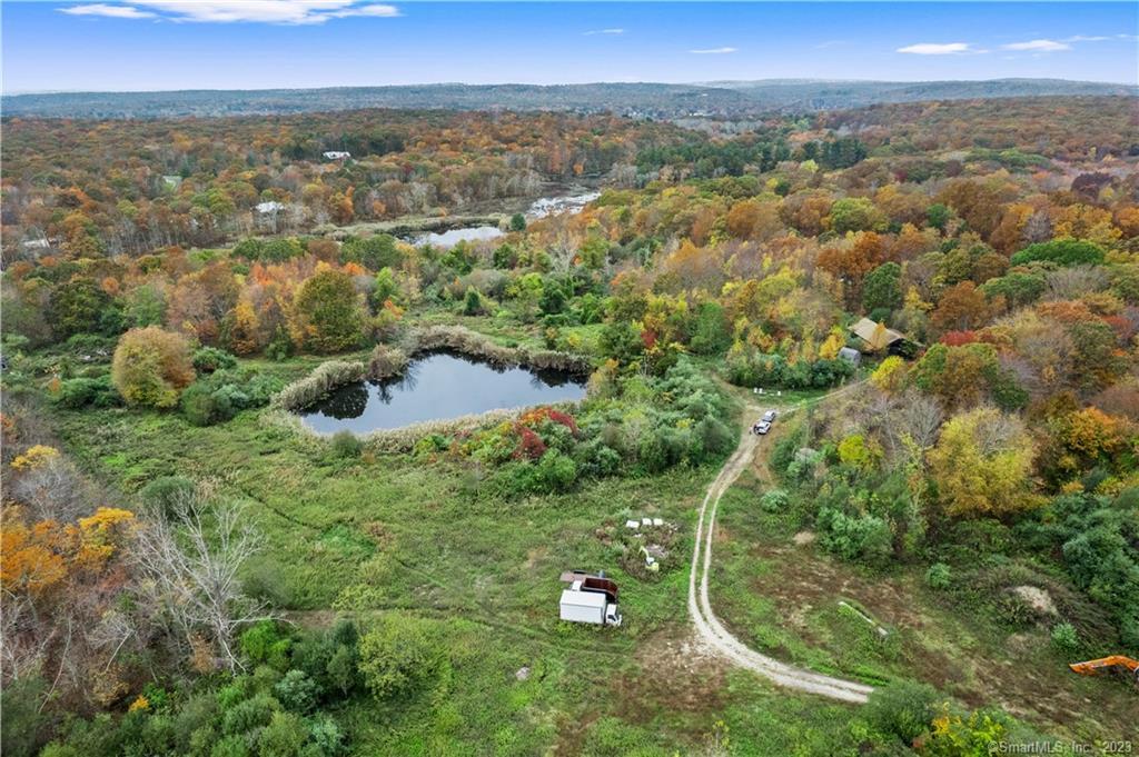 5 Old Stagecoach And Boston Post Road Old Lyme, CT 06371 - Photo 8 of 17 Small working barn used to house equipment to chip stumps and house with working well and electric.