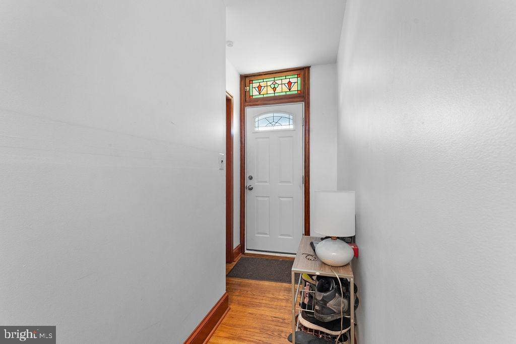 339 Drew Street Baltimore, MD 21224 - Photo 25 of 26 a view of a hallway with painted walls