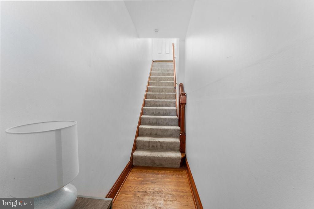 339 Drew Street Baltimore, MD 21224 - Photo 5 of 26 a view of a hallway with stairs