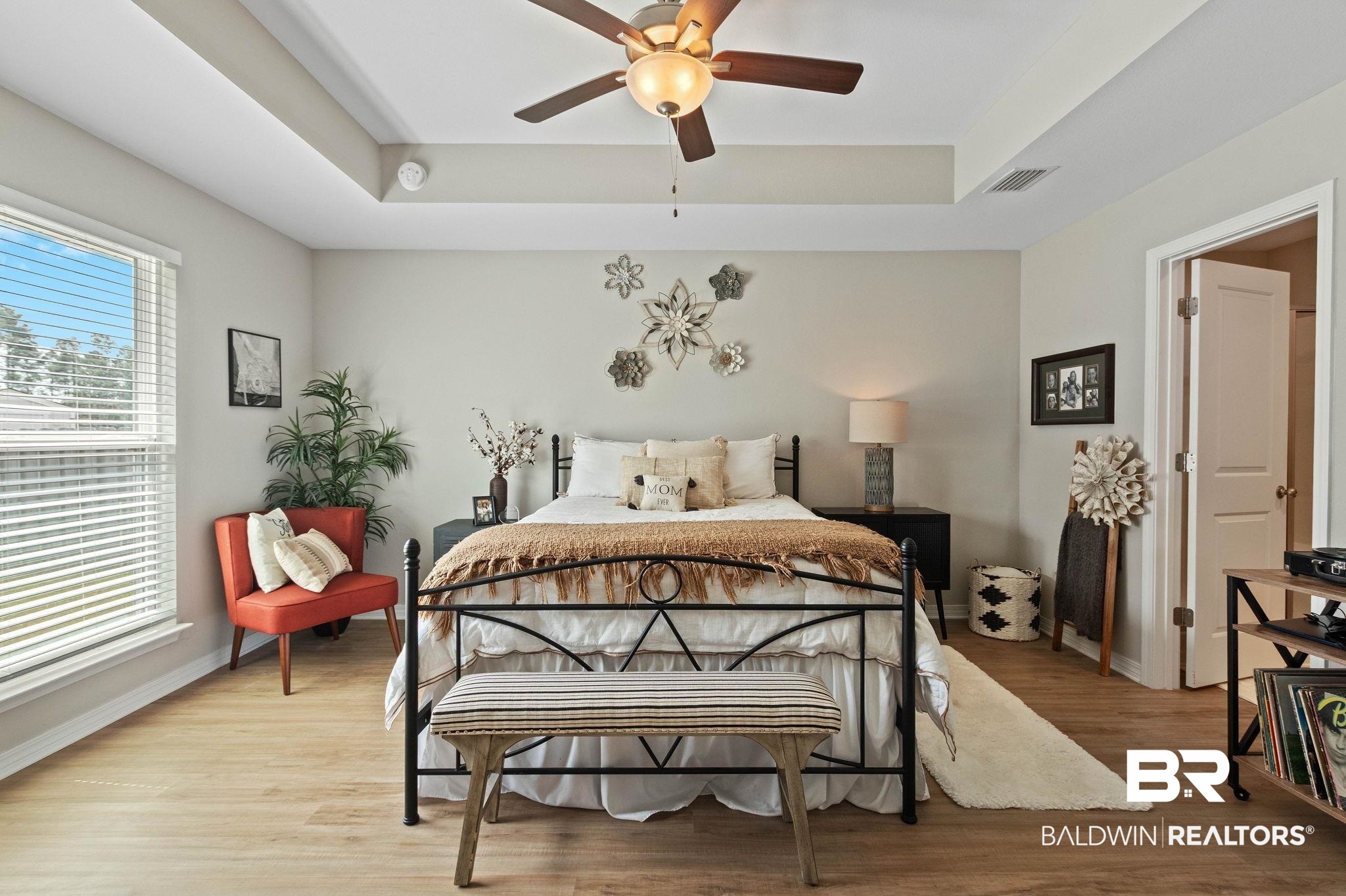 1203 Hayward Loop Foley, AL 36535 - Photo 15 of 41 Bedroom with a raised ceiling, light wood finished floors, and a ceiling fan