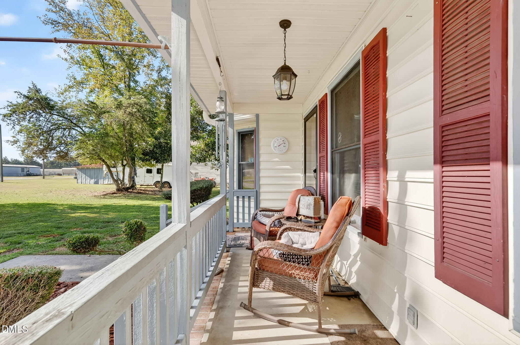 350 Grantham School Road Goldsboro, NC 27530 - Photo 6 of 54 a view of a two chair in the patio with a backyard