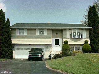4311 List Road Red Lion, PA 17356 - Photo 1 of 1 a car parked in front of a house