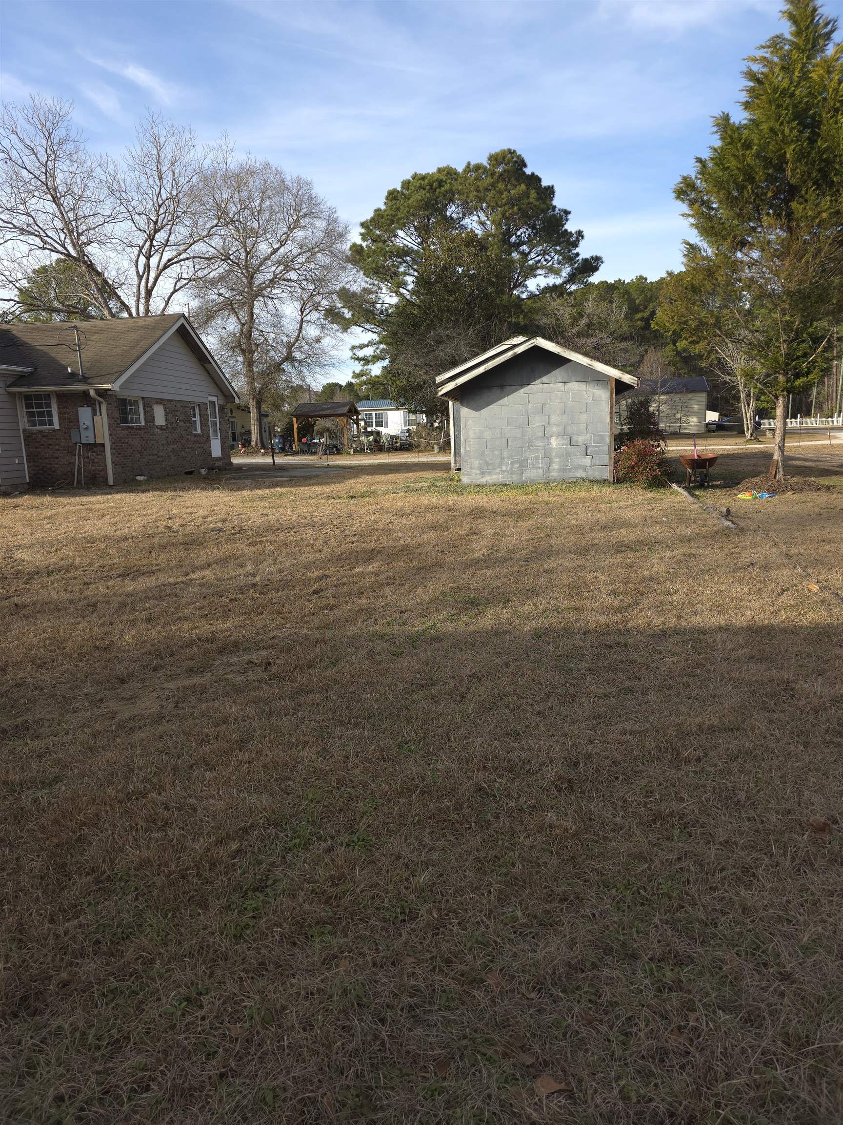1795 Star Bluff Road Longs, SC 29568 - Photo 25 of 26 View of green lawn featuring an outbuilding