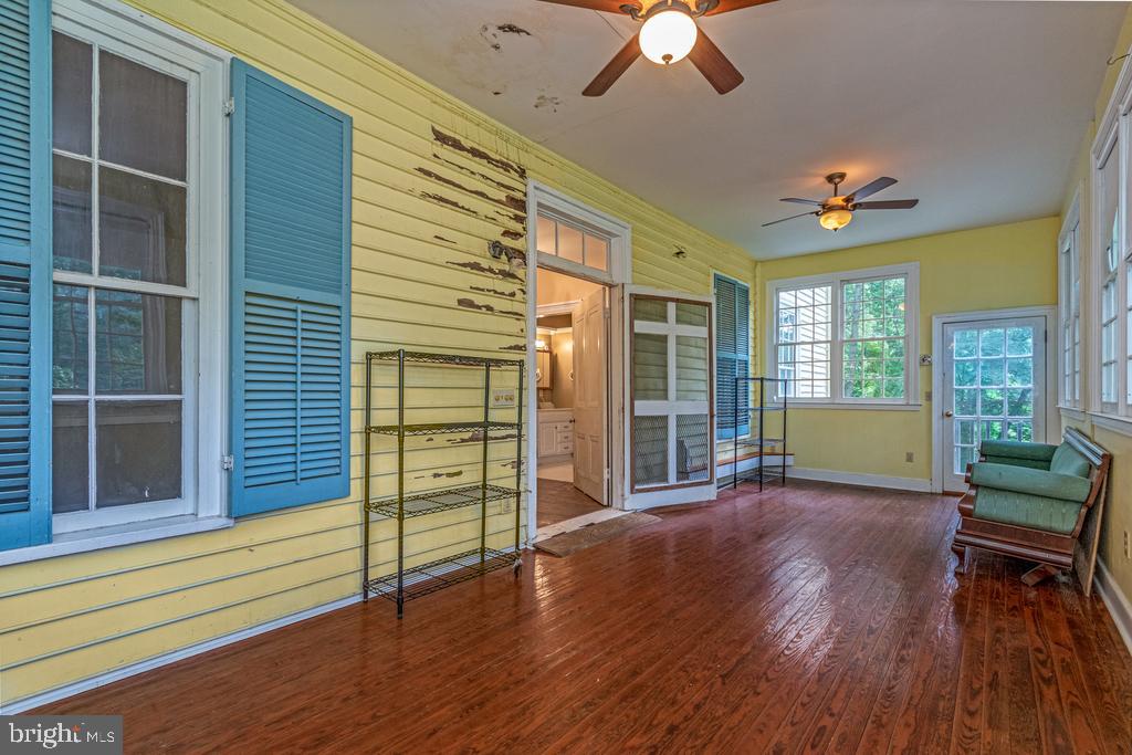807 Holly Corner Road Fredericksburg, VA 22406 - Photo 12 of 57 a view of a livingroom with furniture and hardwood floor