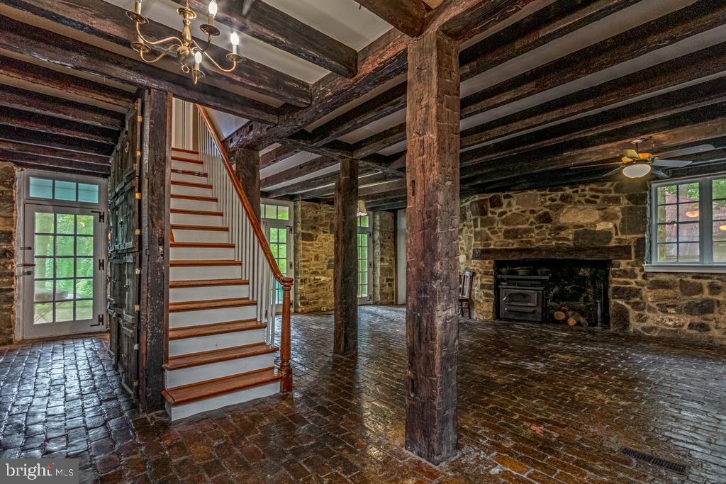 807 Holly Corner Road Fredericksburg, VA 22406 - Photo 27 of 57 a view of a livingroom with fireplace and stairs
