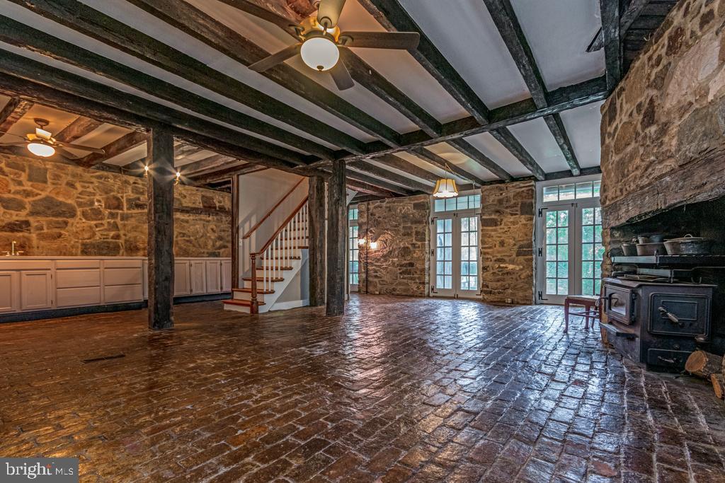 807 Holly Corner Road Fredericksburg, VA 22406 - Photo 28 of 57 a view of empty room with wooden floor and fan