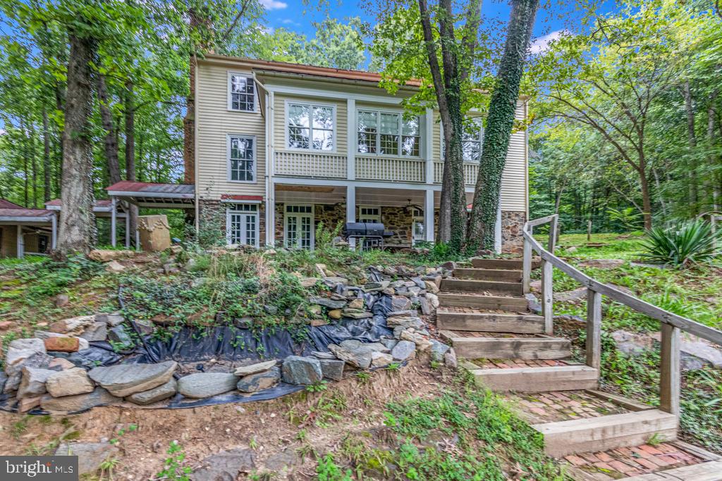 807 Holly Corner Road Fredericksburg, VA 22406 - Photo 39 of 57 a front view of a house with a yard