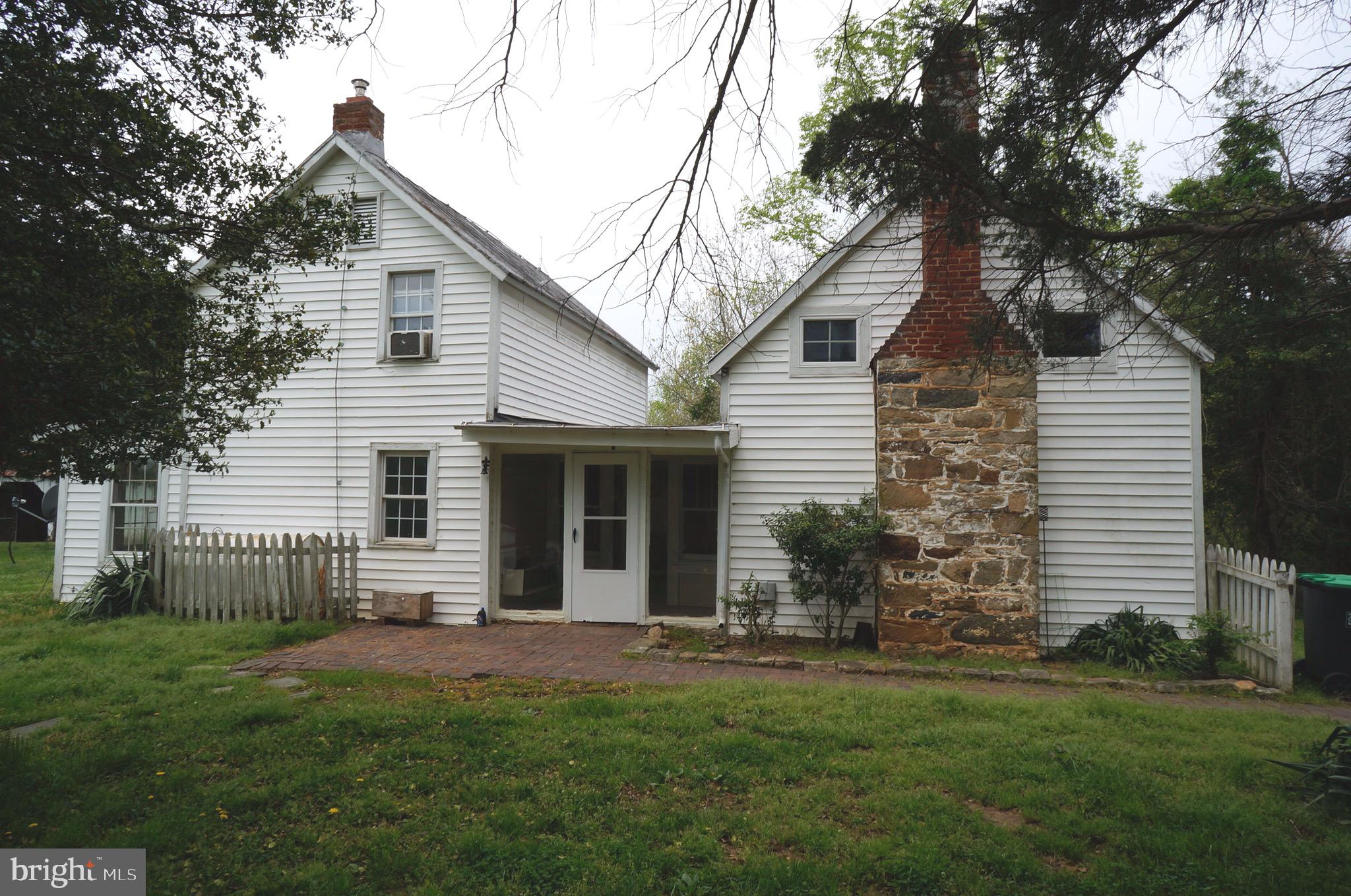 807 Holly Corner Road Fredericksburg, VA 22406 - Photo 44 of 57 a front view of house with yard and green space