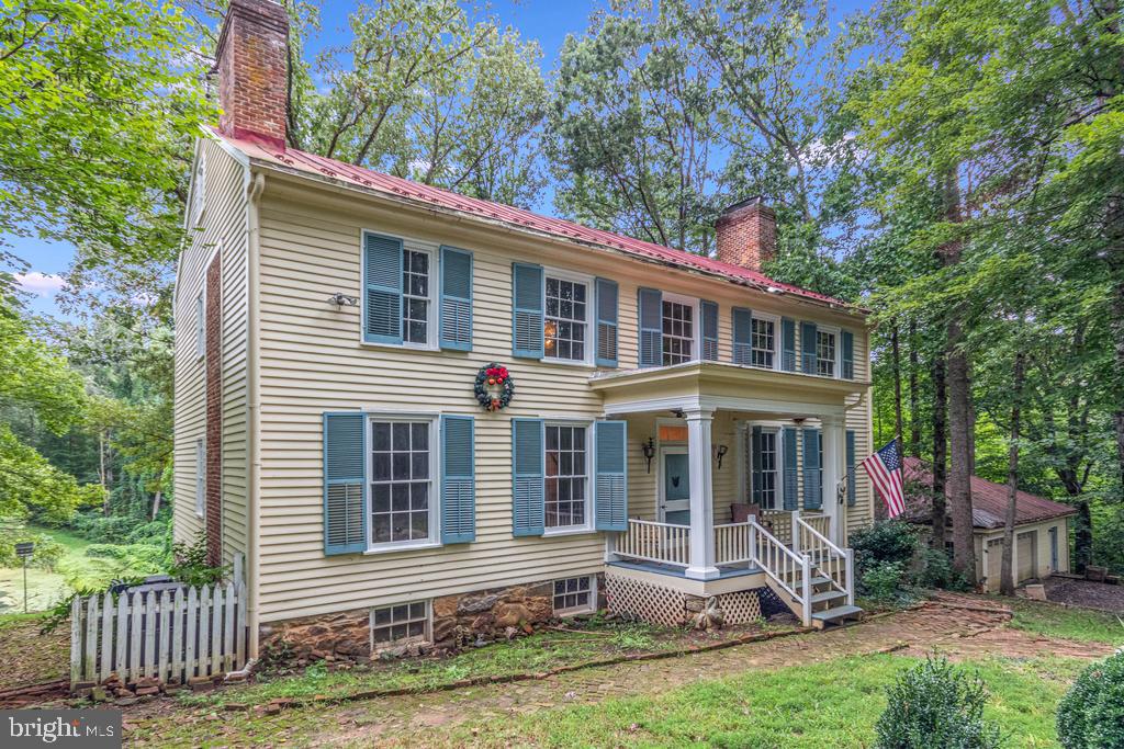 807 Holly Corner Road Fredericksburg, VA 22406 - Photo 6 of 57 a front view of a house with a yard