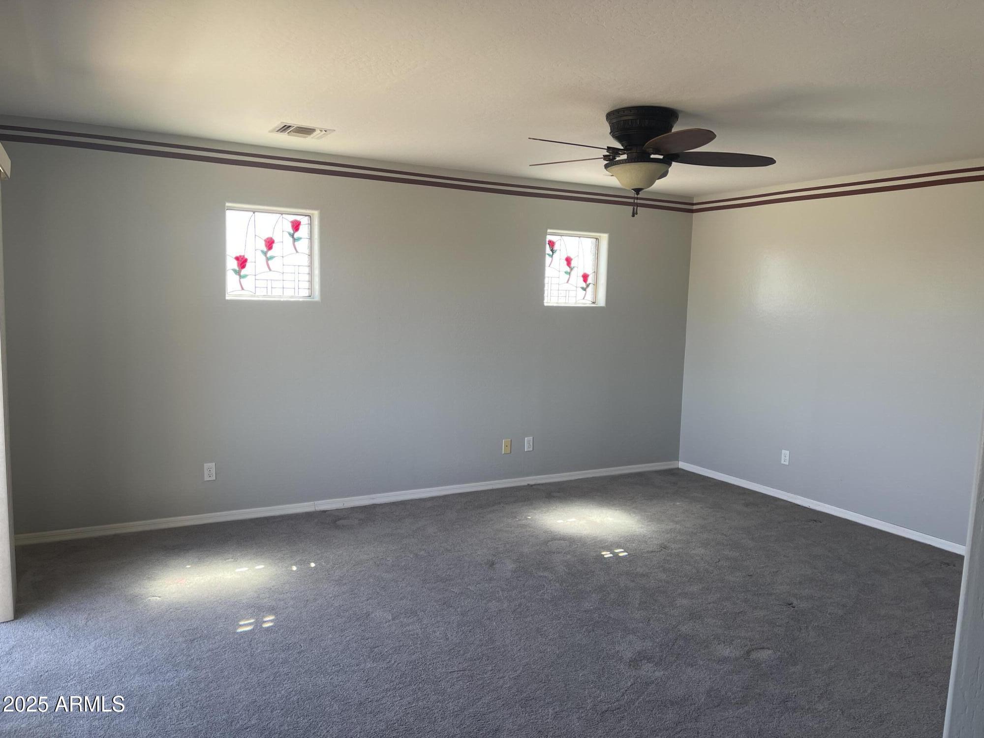 51355 West Century Road Maricopa, AZ 85139 - Photo 11 of 33 a view of an empty room