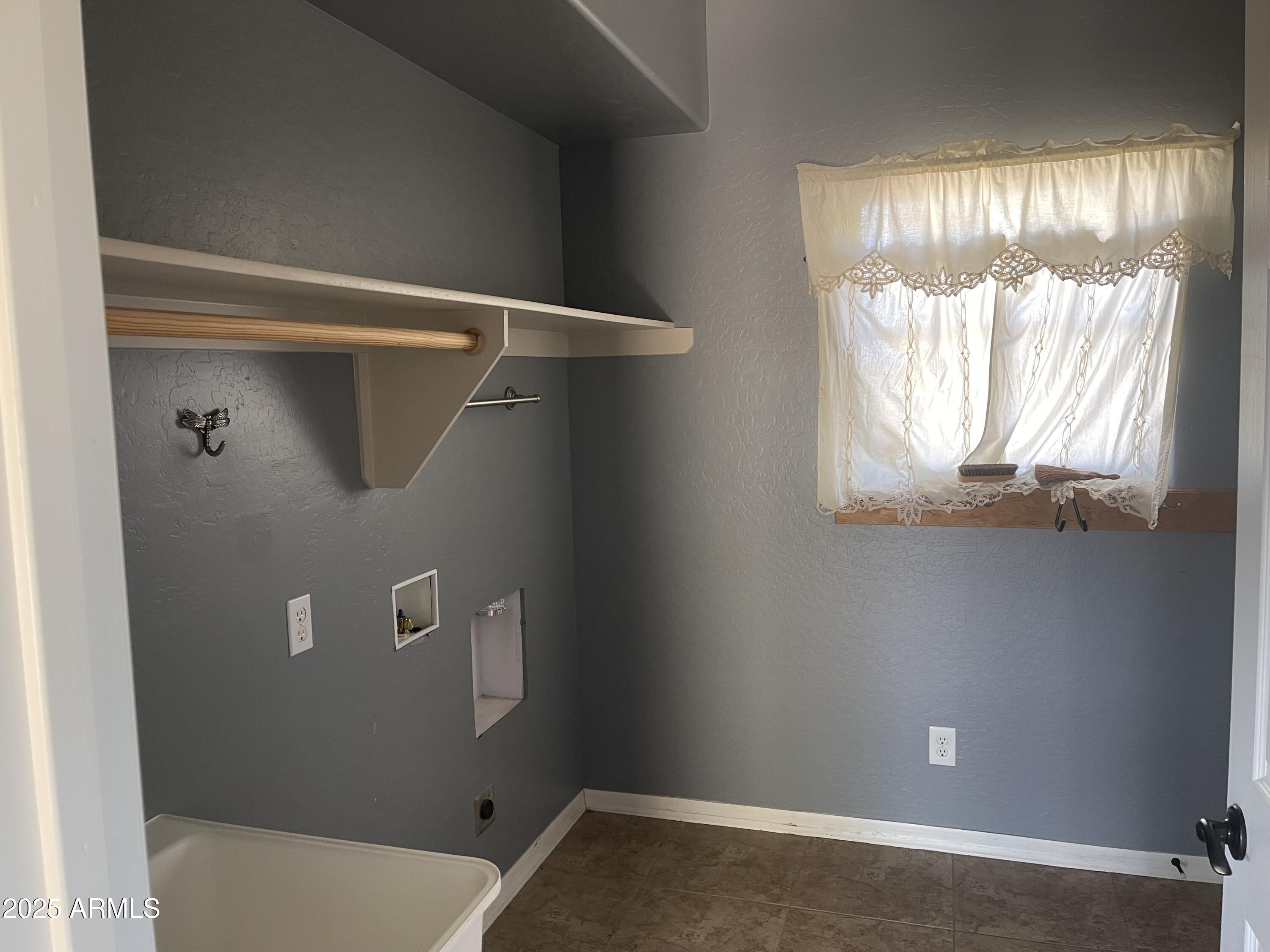 51355 West Century Road Maricopa, AZ 85139 - Photo 7 of 33 a view of an empty room