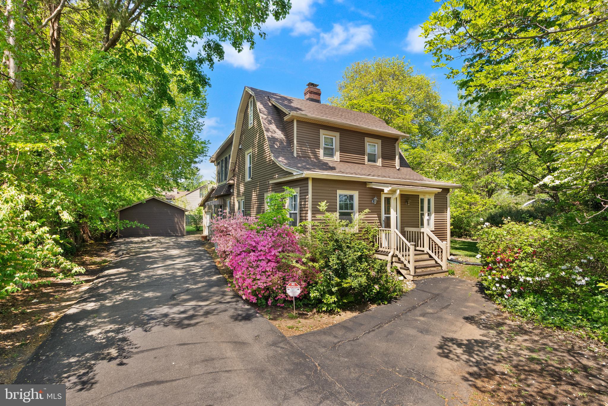 Chain Bridge McLean, VA 22101 - Photo 18 of 60 a front view of a house with a yard