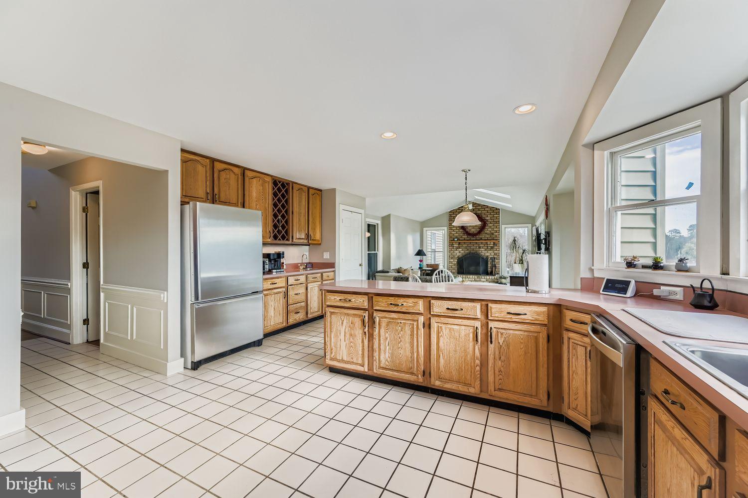1419 Pond Ridge Drive Pasadena, MD 21122 - Photo 11 of 49 Spacious kitchen with natural light and charm.