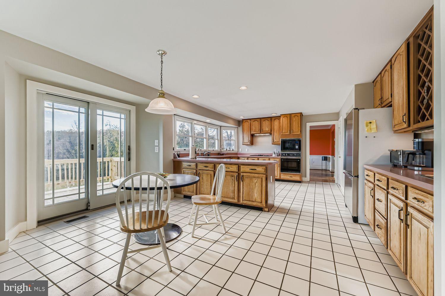 1419 Pond Ridge Drive Pasadena, MD 21122 - Photo 12 of 49 Bright and airy kitchen with scenic views.