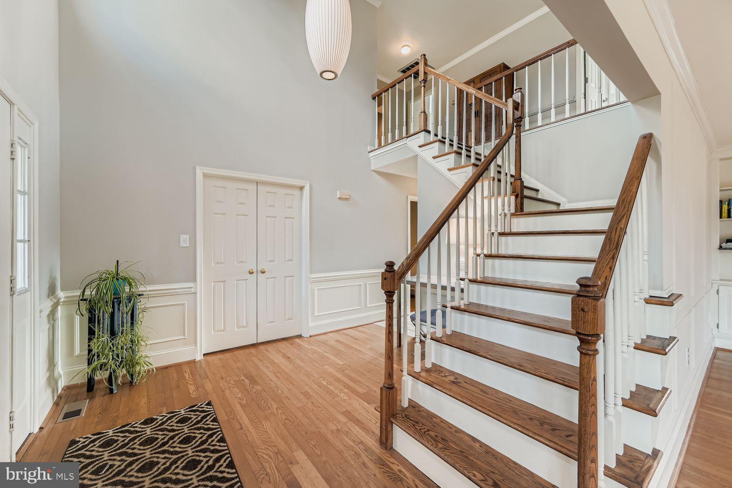 1419 Pond Ridge Drive Pasadena, MD 21122 - Photo 5 of 49 Elegant foyer with grand staircase allure.