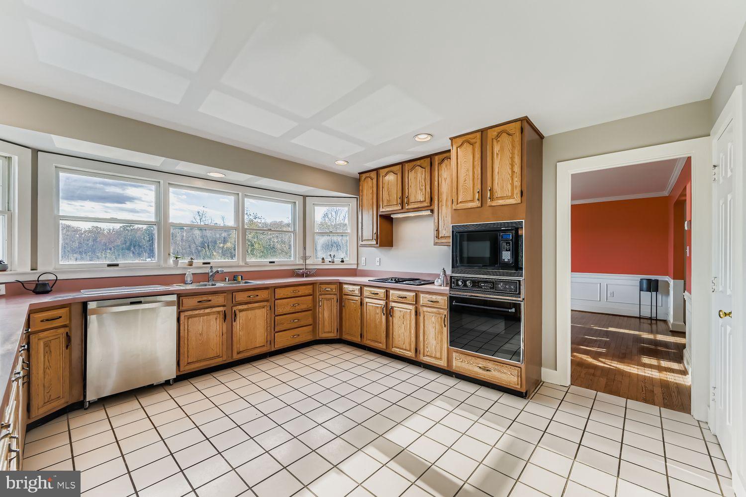 1419 Pond Ridge Drive Pasadena, MD 21122 - Photo 10 of 49 Bright kitchen with scenic views and charm.
